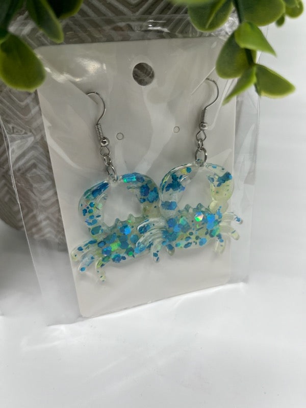 Crab Earrings. Blue and green glitter bomb in Resin.