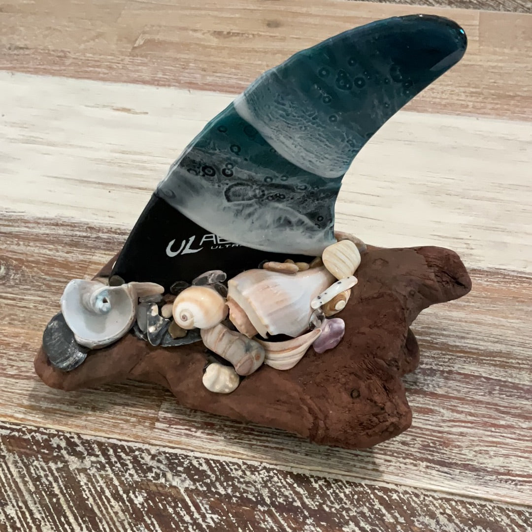 Resin Wave Surfboard Fin with OBX Shells on Driftwood